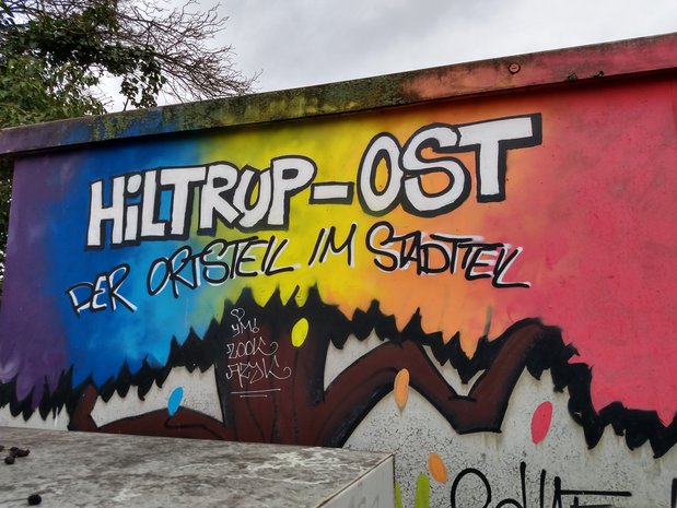 Foto von einer Mauer mit Grafitti in Hiltup-Ost